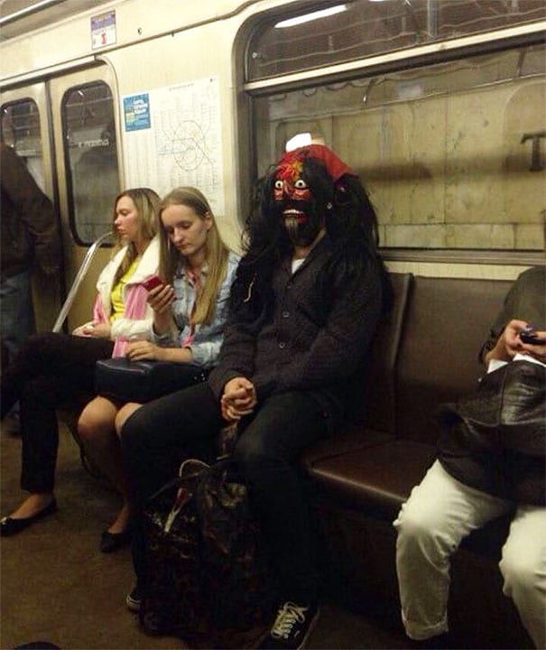Man Wearing Crazy Mask On The Subway