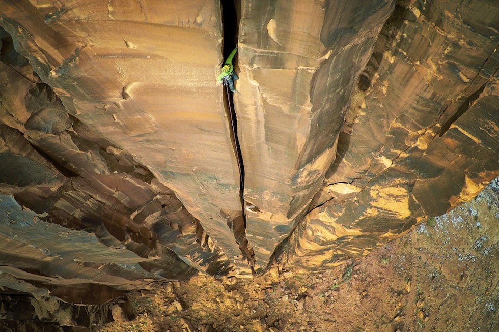 Climber on Large Mountain